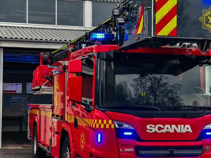 Trekantbrand. Brandbil.