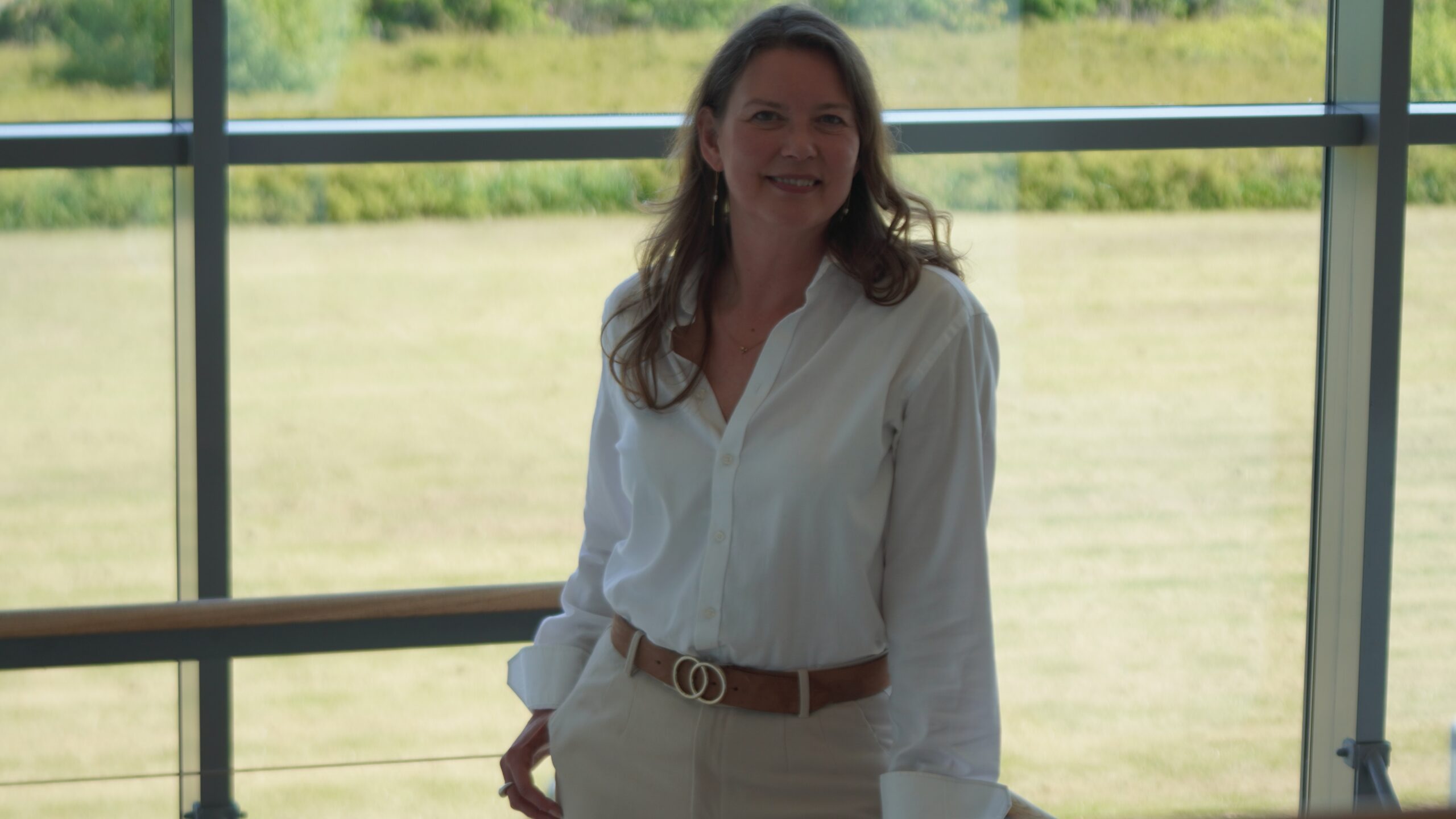 Når andre bygger læhegn, bygger Hanne vindmøller Når andre bygger læhegn, bygger Hanne vindmøller